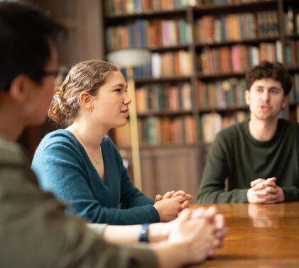Sidcot Sixth Form students debating in the Old Library